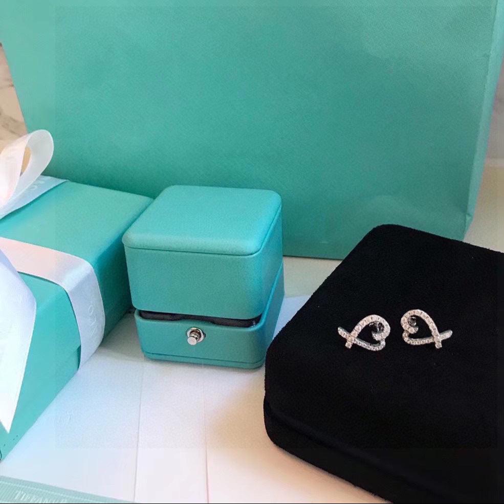 18K T Diamond Earrings