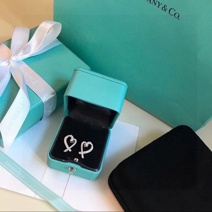 18K T Diamond Earrings